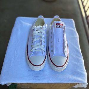 Man and woman, converse sneaker shoes. Men’s size 7, women’s size